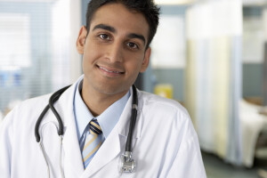 Male-doctor-smiling-portrait-close-up-Med-Res-72991363